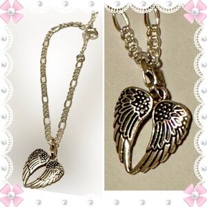 Bracelet - 9” silver tone chain with angel wings charm. New - no flaws